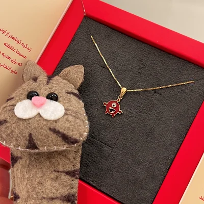 مدال عروسک تک چشم