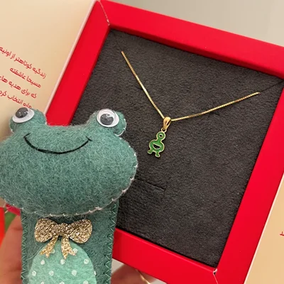 مدال عروسکی موجود سبز